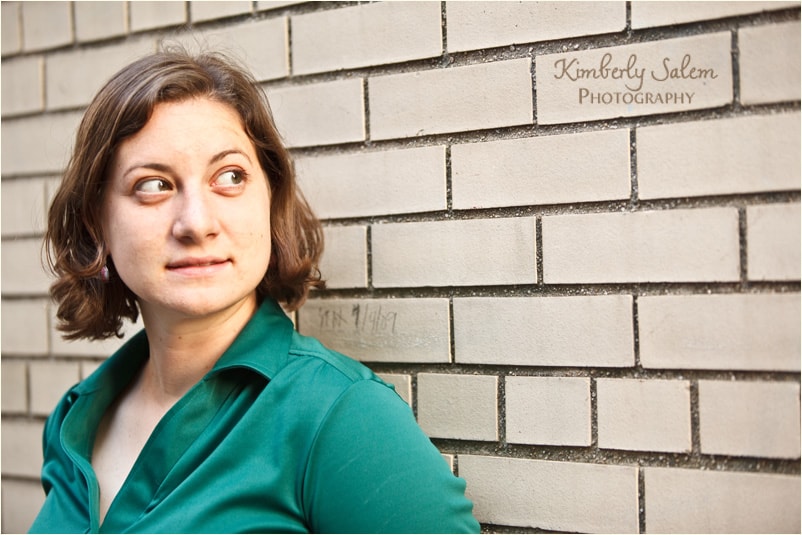 sari against brick wall